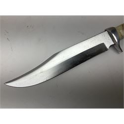 German Original Puma-Bowie knife, with maker's name and number 6396 to the 16.5cm blade, stamped number 73373 to the guard, antler grip, in original hard plastic case with brown leather sheath, also marked Puma