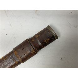 George V British Army 1897 pattern officers sword with plain 82cm fullered steel blade, pierced  basket hilt with George V cypher and wire bound leather grip with chequered backstrap; in leather covered field service scabbard L101cm overall; and another officer's sword in relic condition lacking scabbard (2)