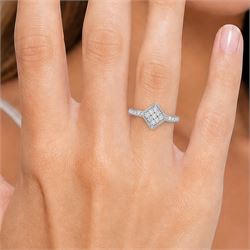 9ct white gold diamond shaped diamond ring, pave set with nine round cut diamonds, with diamond set shoulders, Birmingham 2006