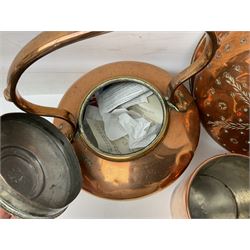Set of three graduating copper sauce pans with covers, with wooden handles and brass detailing, together with a copper culinary mould depicting a cockerel, four graduating frying pans, colander, kettle, tool holder and two grain pots, etc