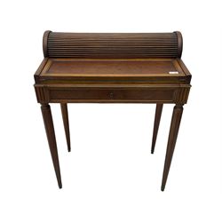 Early 20th century French plum pudding mahogany petite writing desk, barrel tambour roll top, fitted with a single cock-beaded drawer activating the tambour roll, the fold-over writing slope with inset writing surface supported by long drawer, fitted with three small drawers and pen rail, raised on fluted tapering supports