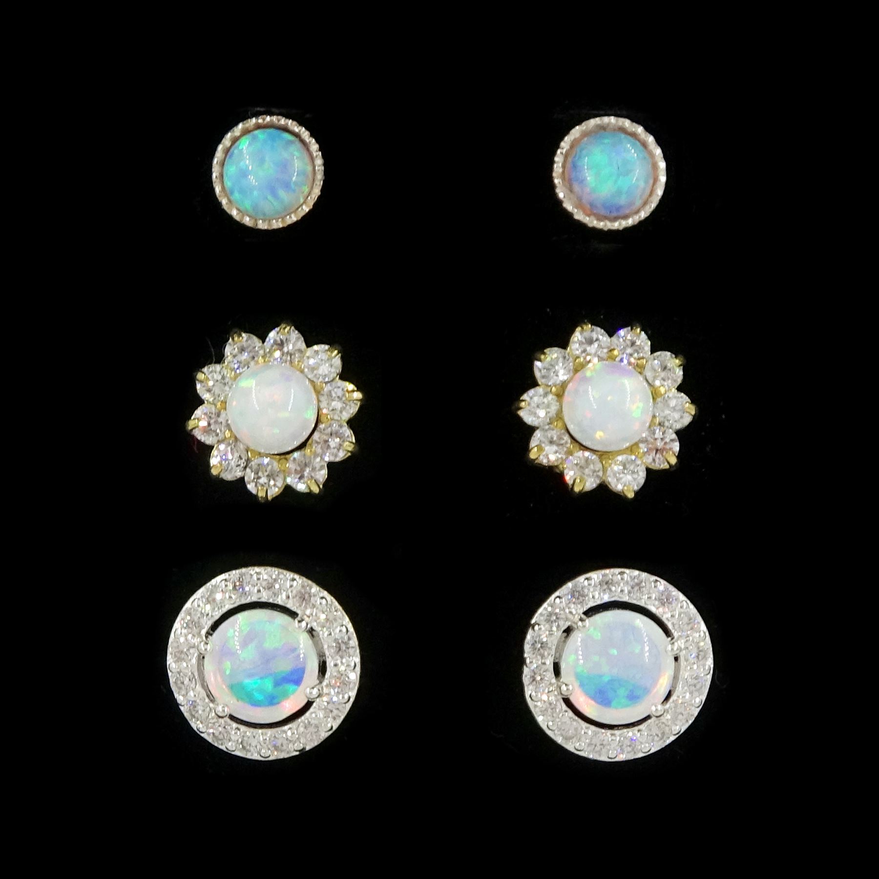 Pair of 9ct gold opal and cubic zirconia stud earrings and two other pairs of silver opal stud earrings