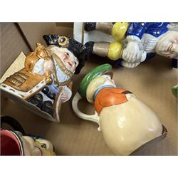 19th century ceramic toby jug with gold anchor mark to base, together with a collection of other toby jugs, tallest H21cm
