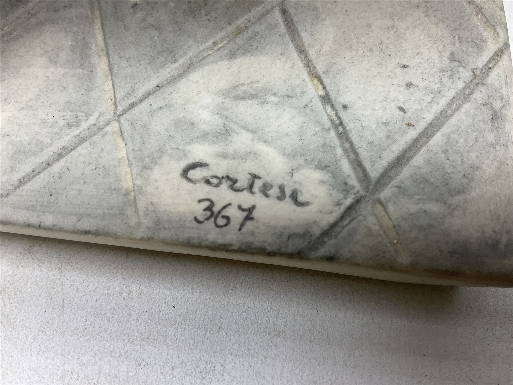 Two Capodimonte figures, comprising The Watchmaker by Curiase and Tramp Seated on a Bench, created by D.Bonalberti, tallest example H24cm