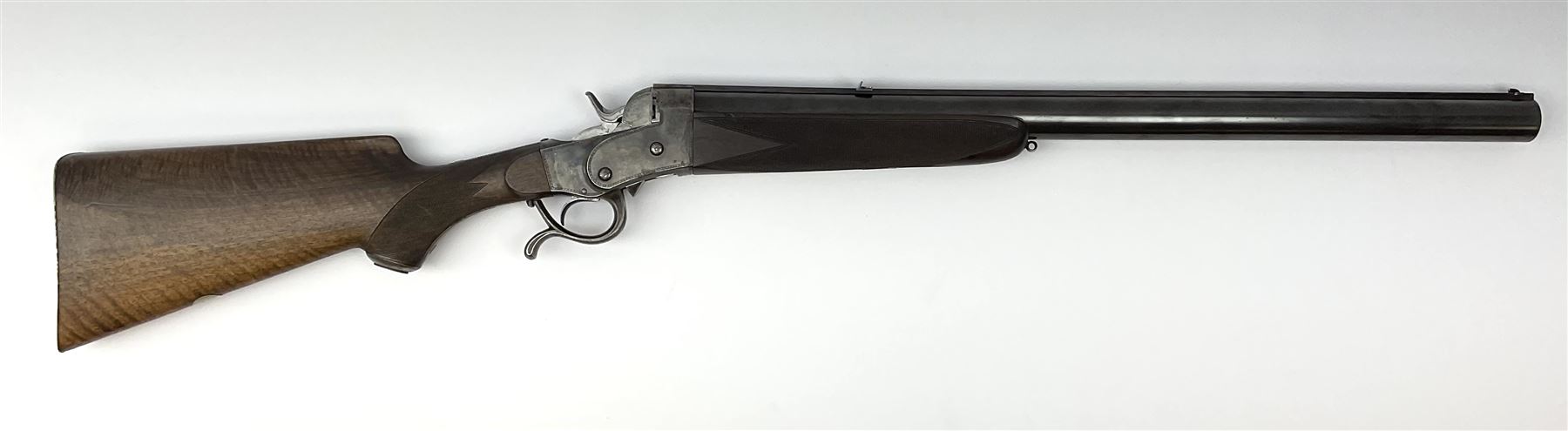 Rare Henry Pieper Liege seven-chambered solid barrel 297/30 calibre rim-fire volley gun with six barrels around a central seventh barrel drilled for simultaneous fire, built on a Remington type rolling block action, blued 62cm barrel with raised rib and twin rear leaf sights, case hardened action complete with loading plate for seven cartridges, walnut stock with chequered pistol grip and fore-end and inset 'silver' cartouche with two Chinese type characters, no.256PLN, L109cm overall