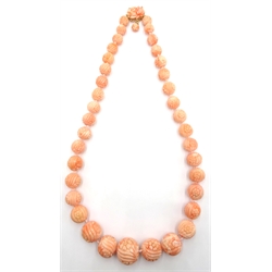  Carved Chinese coral bead necklace, with gold clasp stamped 14K  