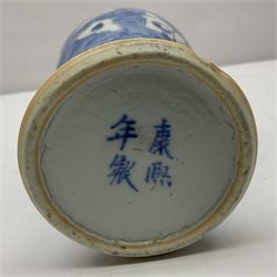 19th century Chinese Kangxi style blue and white jar and cover, decorated with figural and landscape scenes, the domed cover with foo dog finial, with four character marks beneath, H22cm