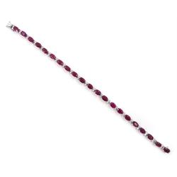 18ct white gold oval ruby and diamond bracelet, hallmarked, total ruby weight 11.00 carat, total diamond weight approx 1.20 carat