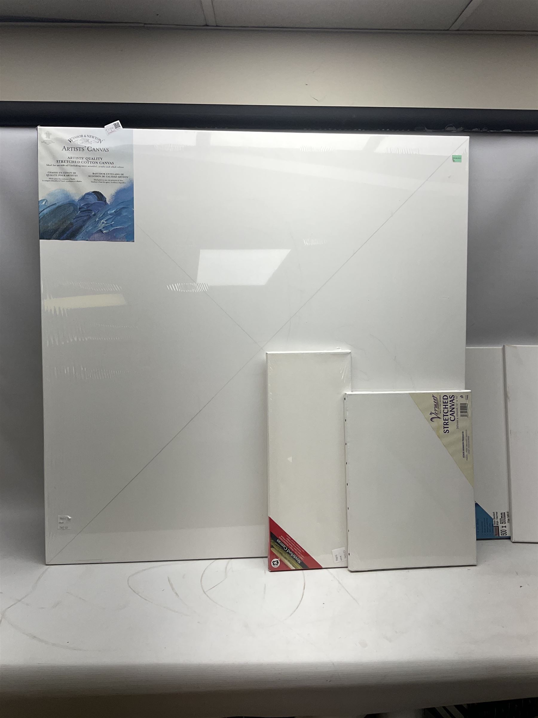 Large quantity of art supplies and equipment to include Crimson & Blake easel, tabletop easel, two large Winsor & Newton canvases and further smaller canvanses, sketchpads, paints etc