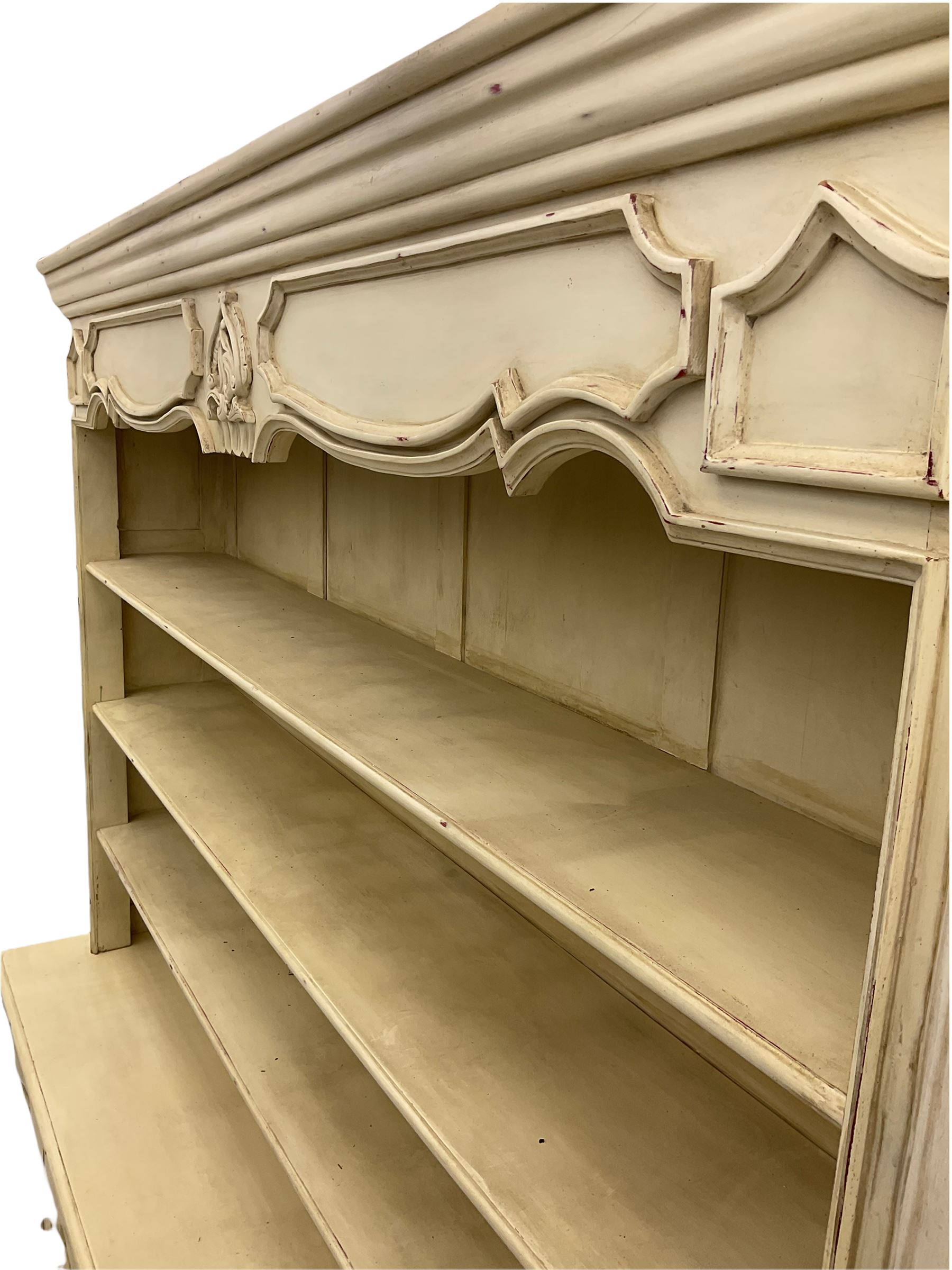 Large French style cream painted dresser, fitted with four cupboards and three tier plate rack