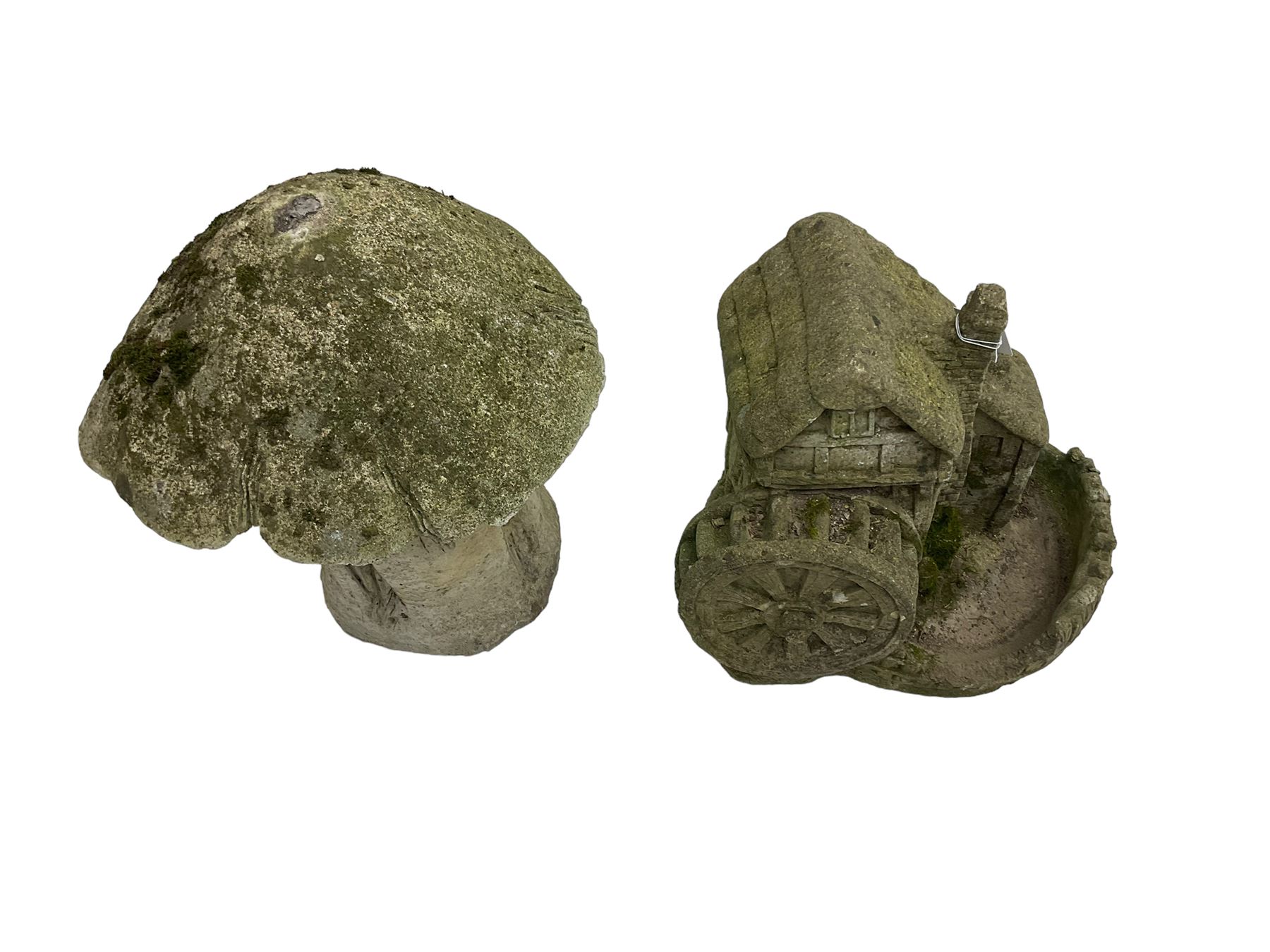 Composite stone garden ornament in the form of a mushroom together with another similar of a windmill (2)