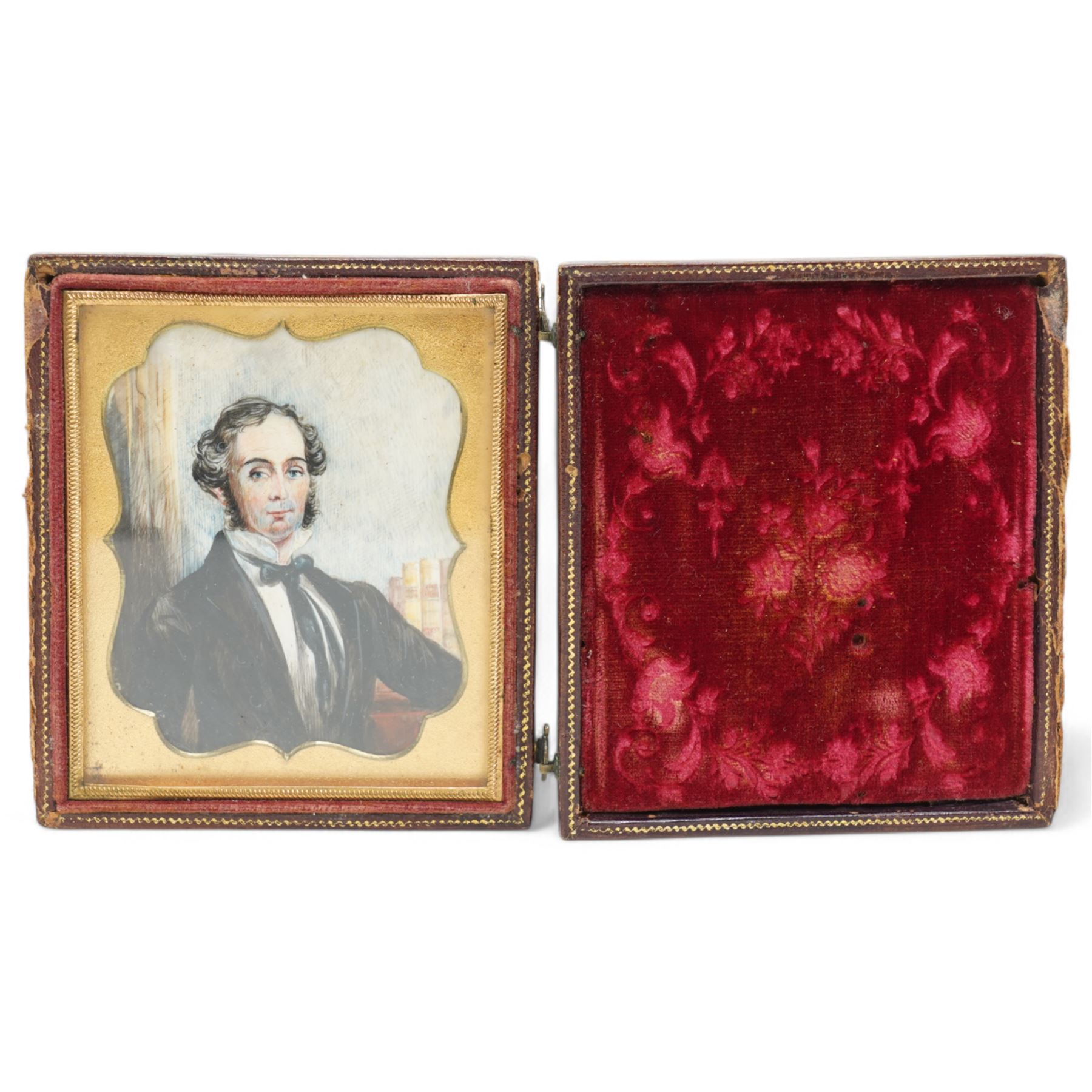 English School (19th Century): Gentleman in his Study, miniature watercolour on ivory unsigned, housed in leather case with embossed foliate decoration, case H9cm W8cm This item has been registered for sale under Section 10 of the APHA Ivory Act