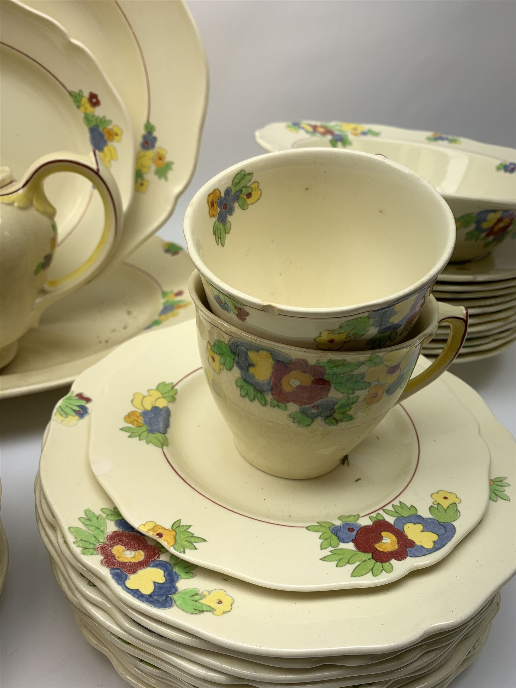 Royal Doulton Minden pattern dinner and tea wares, number D5334, together with a selection of silver plated flatware, most marked for Walker & Hall. 