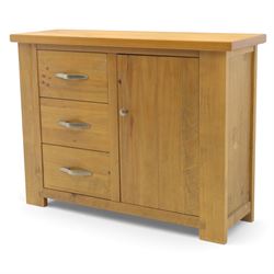 Contemporary pine side cabinet, rectangular top with moulded edge, fitted with three drawers with brushed metal handles alongside a single cupboard door with round metal knob, plain sides, raised on square block feet