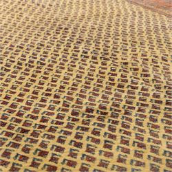 North West Persian Arak hand-knotted carpet, ivory ground densely decorated with an all-over diagonal boteh lattice design within a madder red main border of stylized rosettes and botehs between multiple narrow floral guard stripes