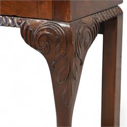 Large George III mahogany bookcase display cabinet, pierced swan neck pediment with floral head roundels over dentil and arcade frieze, enclosed by two geometric astragal glazed doors with lozenge motifs, the lined interior fitted with three shelves, gadrooned lower rail over acanthus carved cabriole supports with ball and claw feet 
