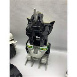 Collection of early 90s Mighty Morphin’ Power Rangers Zords, figures and accessories. Titanus the Carrier Zord, marked Bandai 1991; Green Dragonzord, incomplete; 1994 White Tigerzord with original instruction manual; 1993 Triceratops Dinozord, Mastodon Dinozord and Sabertooth Tiger Dinozord, Pterodactyl Dinozord, missing guns; with 1993 Power Morpher and original Power Coins, with further related figures, accessories and weapons