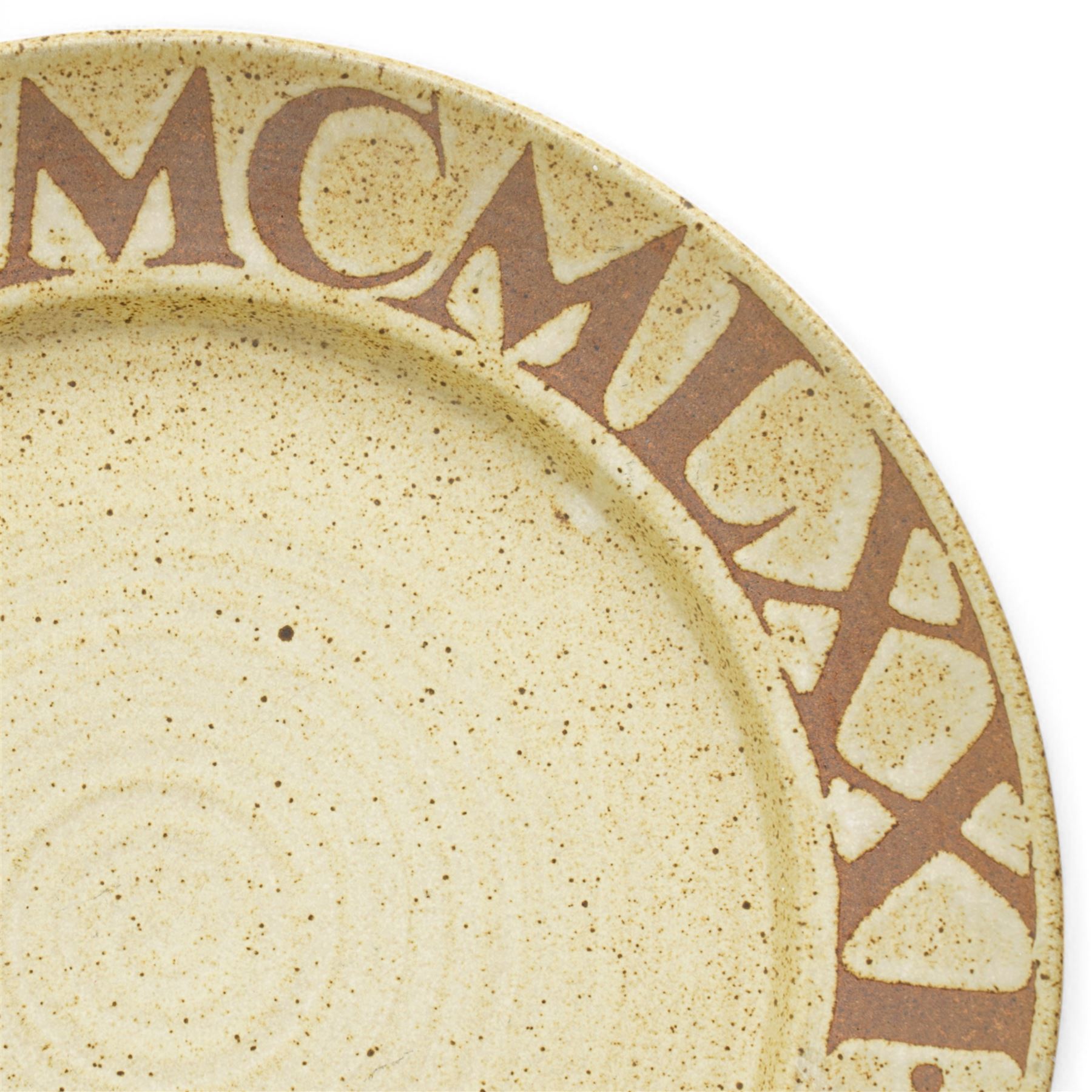 David Lloyd Jones (1928-1994): large studio pottery charger, the 'Eboracum' script in brown against a light green ground with brown speckles, impressed mark to base, D47cm 