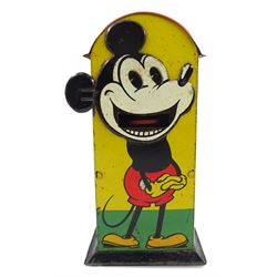 Saalheimer & Strauss Germany 'Smile Please' Mickey Mouse mechanical tin-plate money bank, Type I, depicting Mickey posing with folded hands on the front and as a photographer with a camera tripod on the reverse along with the motto 'If you only pull my ear you will see my tongue appear. Place a coin upon my tongue save your money while you're young'. H17.5cm