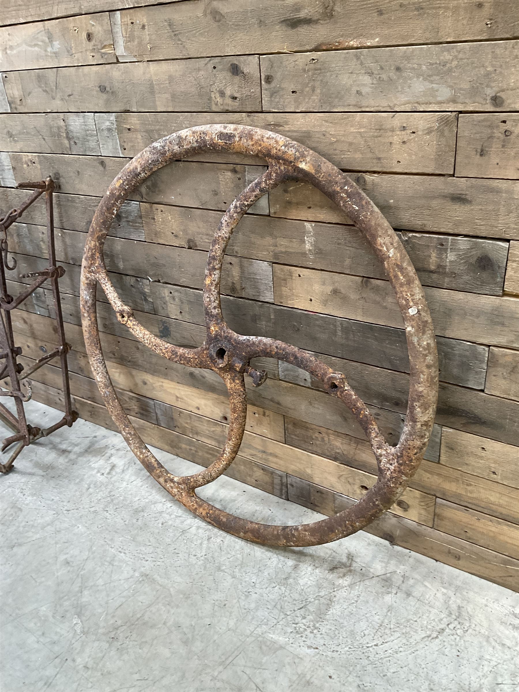 Two vintage agricultural harrows and cast iron machinery wheel/gear