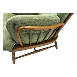 Ercol - mid-20th century three-piece suite, comprising two-seater sofa, upholstered in green fabric with teak frame, on splayed supports with stretcher (W142cm, D95cm, H87cm); with matching pair of armchairs (W82cm, D95cm, H87cm)