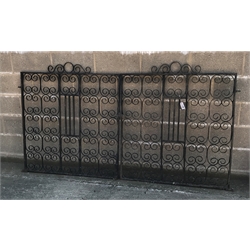  Pair of wrought scroll work metal driveway gates fitted with latch, W212cm, H118cm  