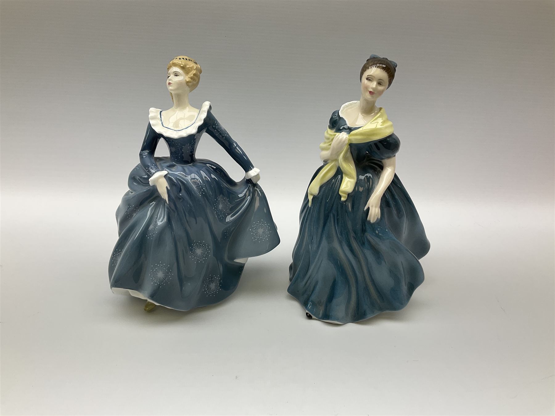 A group of eight Royal Doulton figures, comprising Simone HN2378, Amy HN3854, Fragrance HN2334, Louise HN3207, Adrienne H2304, Michele HN2234, Fine Lady HN2193, Winsome HN2220 and a Coalport figure, Polly. 
