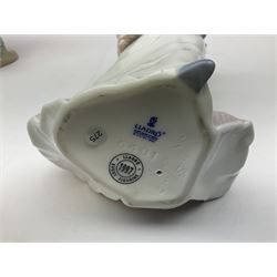 Three Lladro figures, comprising, Dreams of Summer Past no 6401, Spring Breeze no 4936 and Breezy Afternoon 5682 together with Lladro plaque Art Brings us Together no 7677, all in original boxes, largest example H35cm