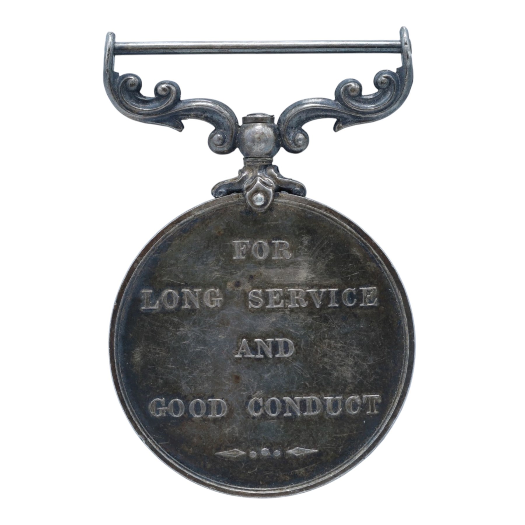 Royal Navy Long Service and Good Conduct Medal awarded to 'Pte H.C Oakman Suffolk Regt', together with a Yorkshire Regiment cap badge