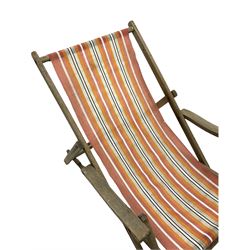 Mid-20th century deck chair with slung striped cover, and a early 20th century clothes horse 
