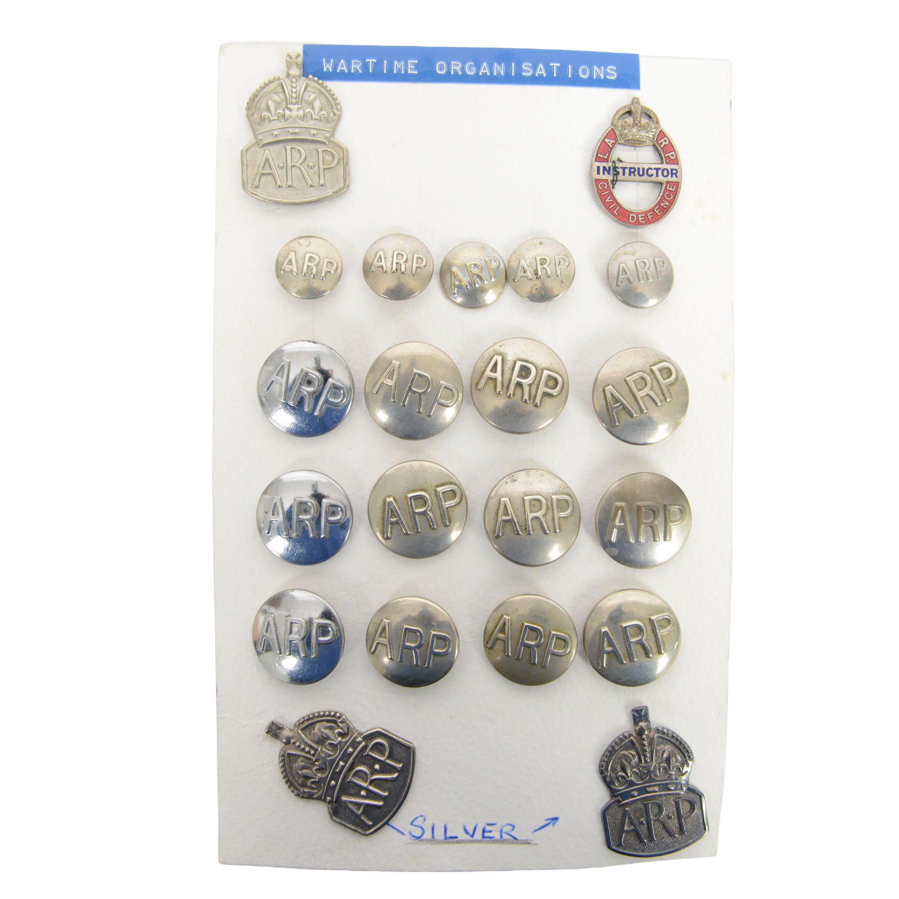 Two WWII A.R.P. silver lapel badges, hallmarked, together with a collection of other ARP buttons