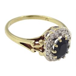 9ct gold oval sapphire and diamond cluster ring with pierced shoulders, hallmarked 