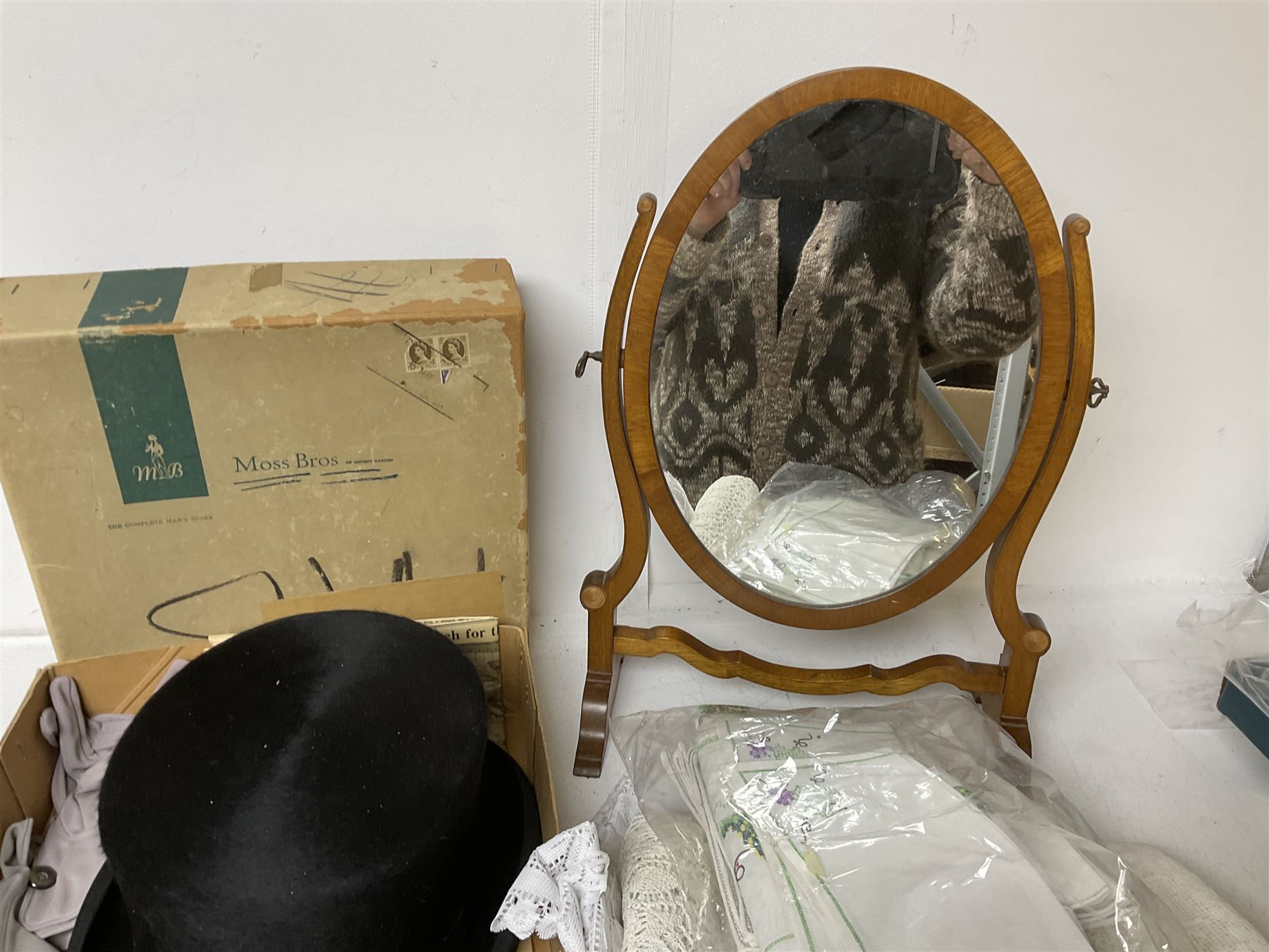 1960s Moss Bros black top hat, together with a wooden swing dressing table mirror and a collection of embroidered and other linen 