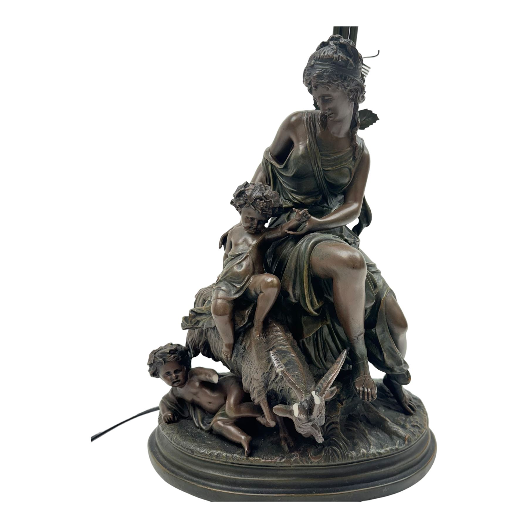 Large table lamp, the base modelled as a woman with putti and goat, with three glass shades, H90cm   