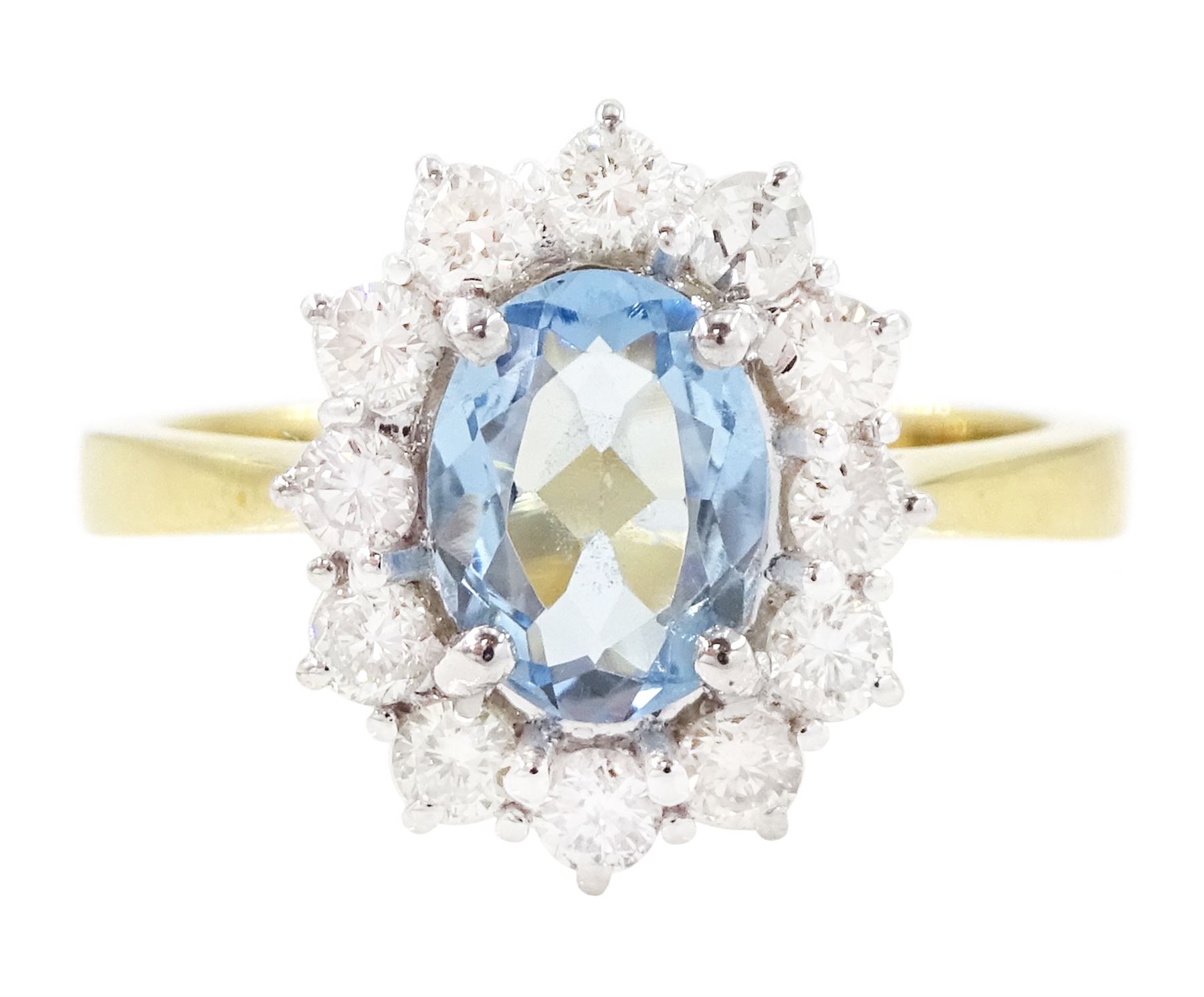 18ct gold aquamarine and diamond cluster ring, oval cut aquamarine of approx 0.80 carat, with round brilliant cut diamond surround, London 2022, total diamond weight approx 0.55 carat