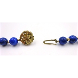 Lapis lazuri, pearl and gold single strand bead necklace, the clasp stamped 9ct 375  