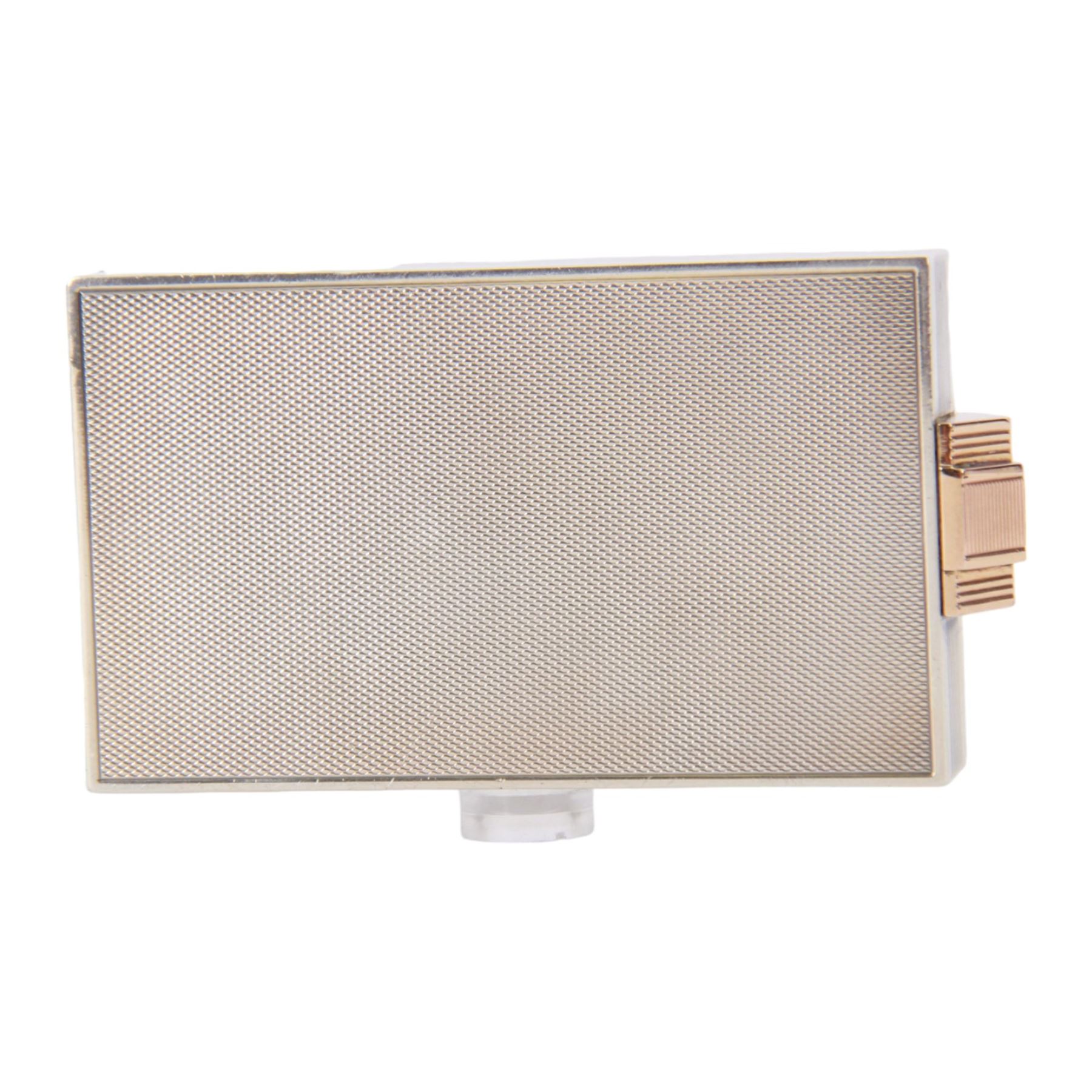 Mid 20th century French silver and gold vanity case, of rectangular form, the hinged cover decorated with an openwork panel of bids and cabochon ruby studded flower heads, opening via a pull clasp to reveal a mirror to the underside and compartment with lift up cover, signed J. Lacloche Paris Cannes, and bearing French assay marks, not including clasp L10cm W6cm D1.5cm

