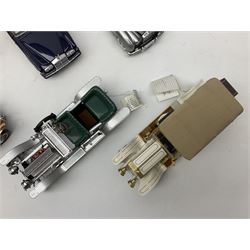 Eight Franklin Mint diecast models of cars, 1911 Rolls-Royce Tourer, The Rolls-Royce Corniche IV, The Mercedes Simplex, 1955 Rolls-Royce Silver Cloud, 1921 Rolls-Royce Silver Ghost, 1907 Rolls-Royce Silver ghost,1929 Rolls-Royce Phantom I,  and 1930 V-16 452 Cadillac Imperial Sedan, all with original tags attached