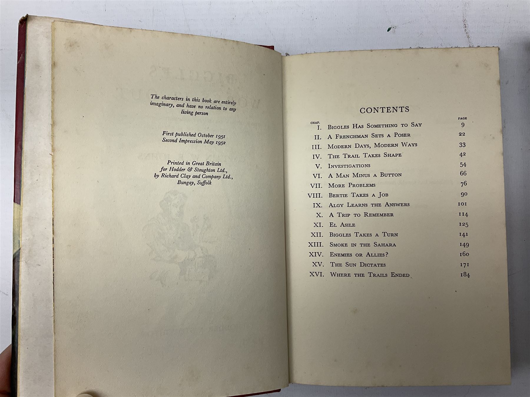 Nine books by Captain W.E Johns, including 'Biggles works it out', Biggles at World's End', 'Biggles in Australia', 'Biggles Presses on' etc, together with Enid Blyton books and other children's books 