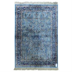 Persian wool pictorial rug, powder blue field woven with deer, birds and floral vines bene...