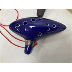 Four ocarinas three 10 hole ocarinas and one 16 hole double ocarina, three of which being from the Legend of Zelda franchise 