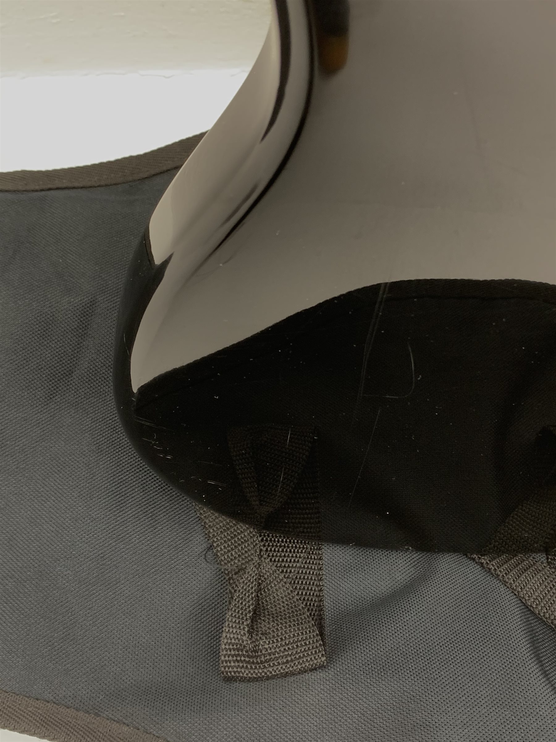  Fender Squier Bronco Affinity Series electric bass guitar, in black and white, serial no. IC021107489, L108cm, in associated Squier soft carrying case. From the collection of the late John Burgess of Beverley who played in the bands Penjants, Wine, Strollers, Revox, Sound Foundation, Pickle Belly Alley, Ragamuffins and Jerryattricks.