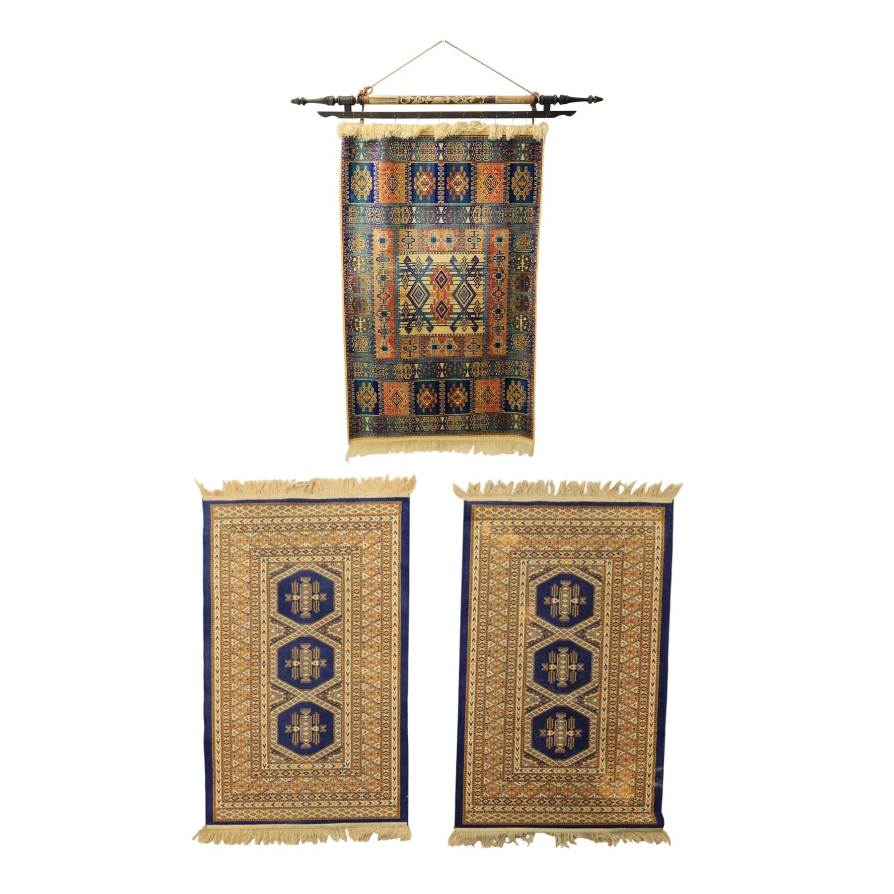Caucasian two small rugs and one wall hanging rug, rugs (W 69cm L 148cm) wall hanger (W 124cm, L 107cm)