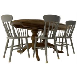 20th century pine extending dining table, oval top over twin bulbous turned pedestal base united by stretcher, with additional leaf (W160cm D120cm H79cm); and set of seven ash painted dining chairs, spindle back, raised on ring turned supports joined by H-stretcher