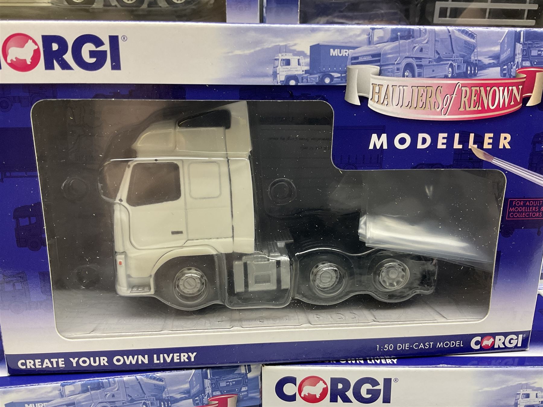 Corgi - limited edition Cafe Connection Albion Reiver Sheeted Platform lorry W.H. Malcolm Ltd Jungle Cafe No.CC11603; and seven Hauliers of Renown Modeller Series vehicles CC19910, 19911, 19912, 19913, 14100, 14000 & 13700 all boxed; together with two Modeller Accessory packs (10)
