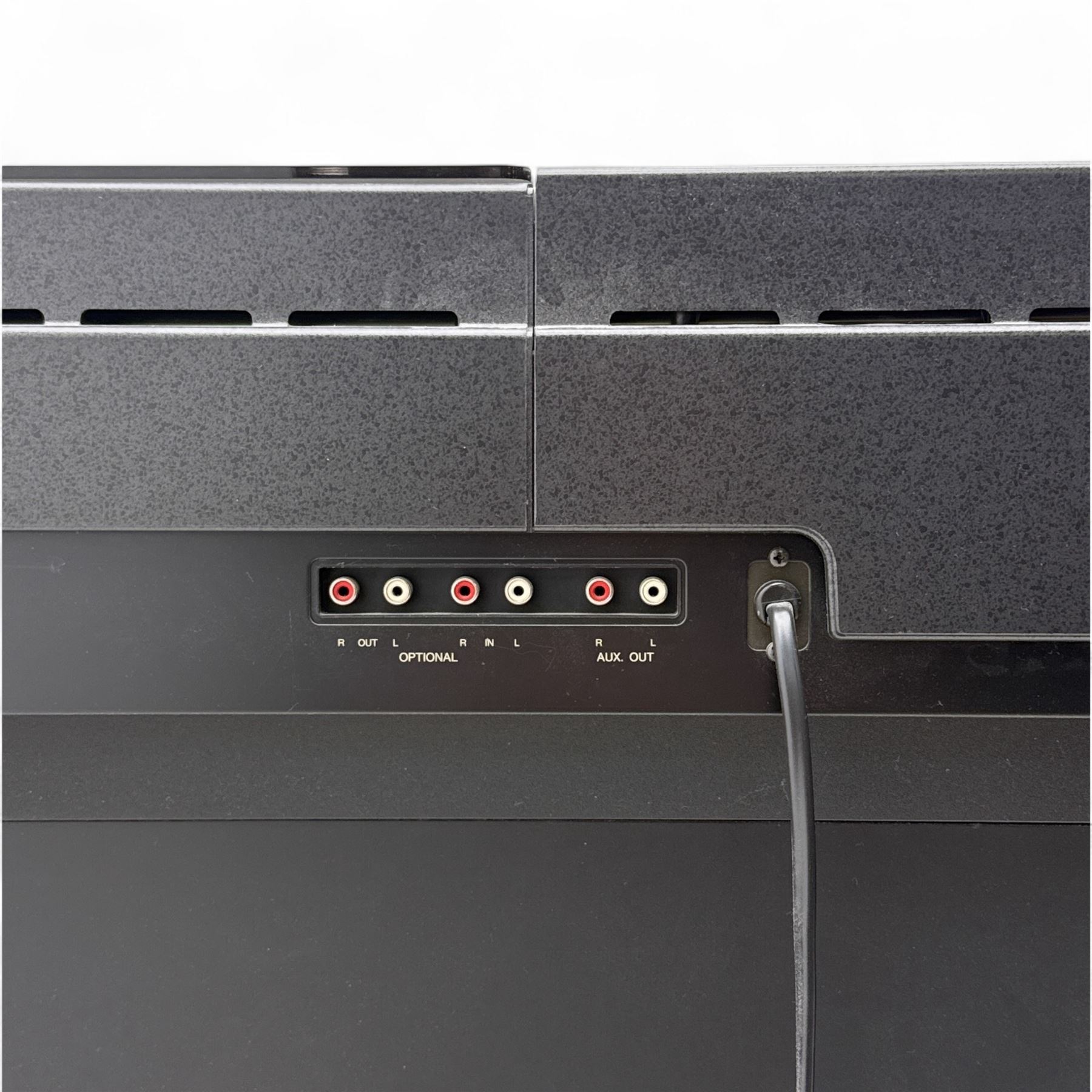 Yamaha Clavinova CLP-550 digital piano, full-size weighted keyboard with integrated pedals and speakers, in dark wood effect casing, accompanied by matching padded bench, Sennheiser headphones, original manuals, and factory-issued cassette tape titled 'Pure & Simple – CLP Digital Pianos'