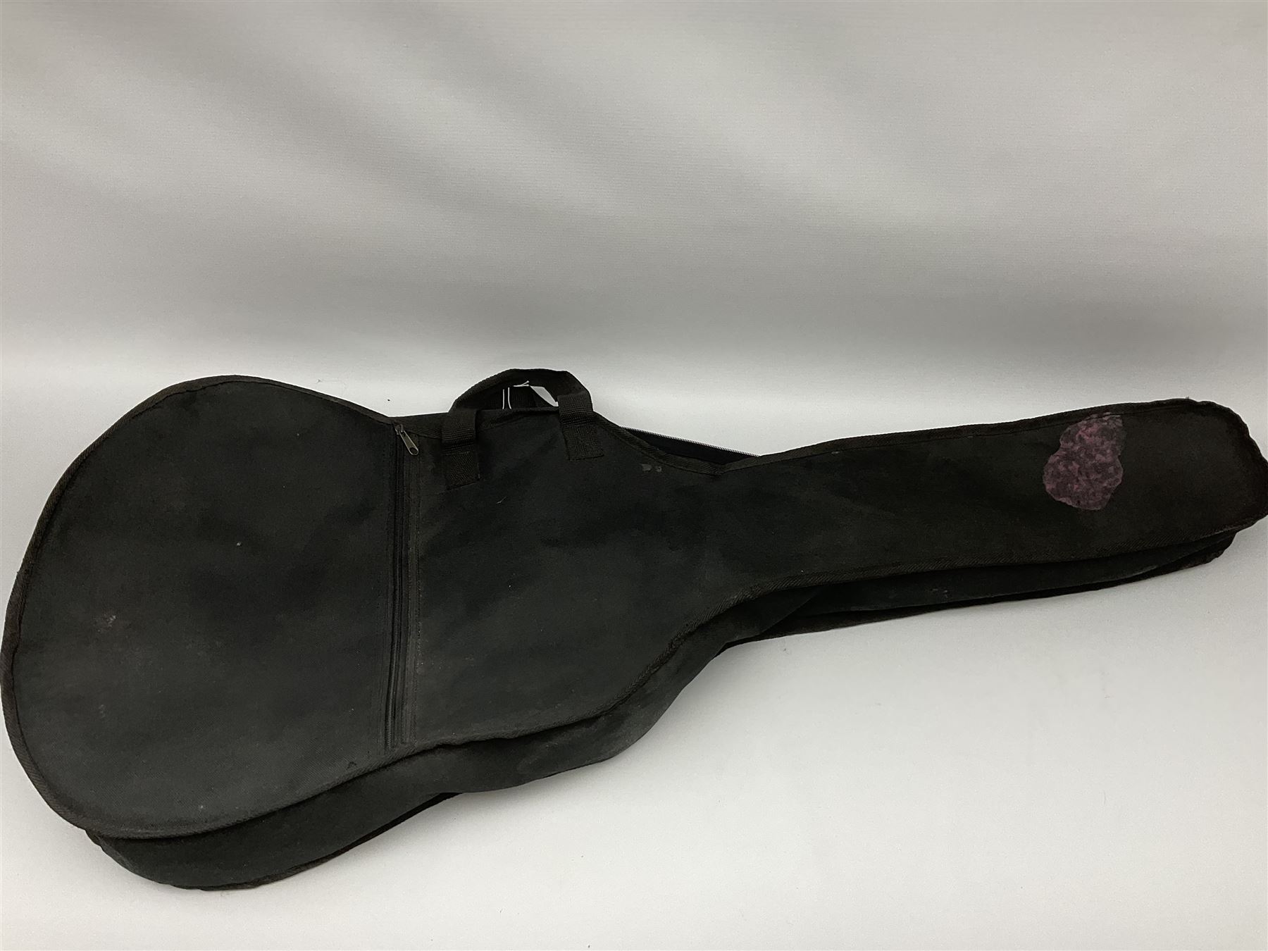 C. Giant acoustic guitar with mahogany back and ribs, bears label with no.4005-650-2, L104cm; in soft carrying case