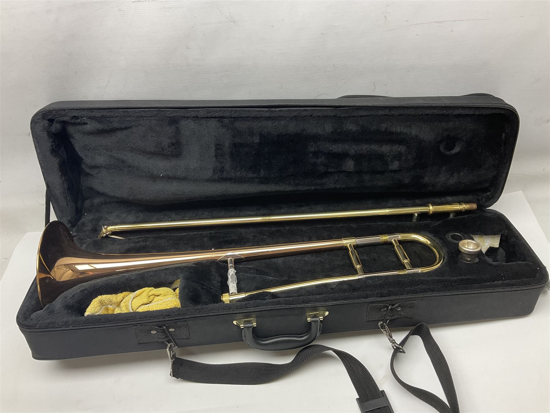 Sebastian Bucklet Aquae Sulis copper and brass trombone No.0910004; in lightweight carrying case; and Kinsman folding tubular chrome music stand in case (2)