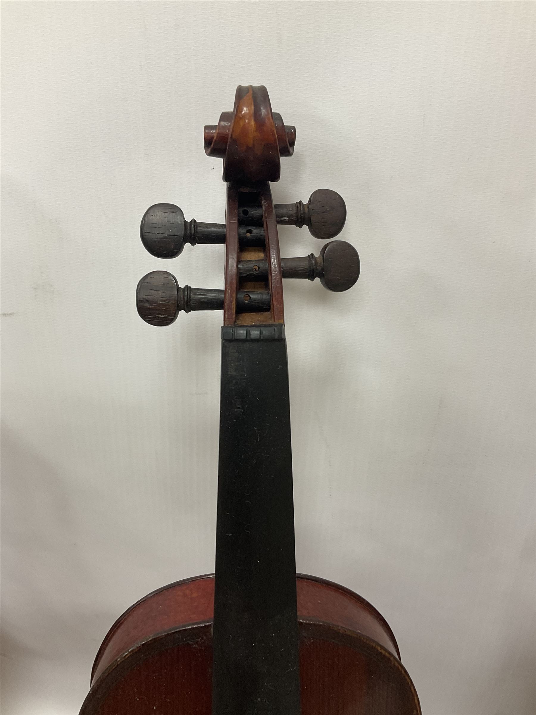 Four violins 1/8th size; half size with Nicolas Bertholini label; three-quarter size with Stradivarius copy label; and full size with Marquis De L'Air label (4)