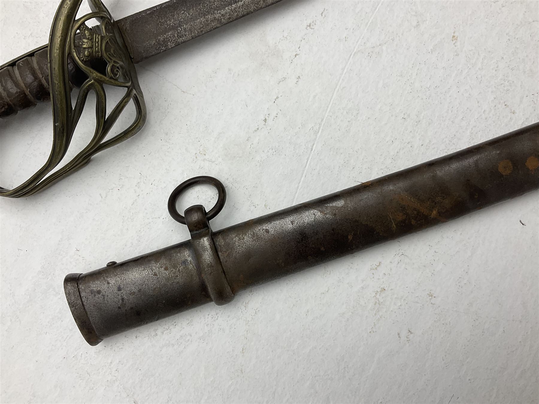 19th century Imperial German army heavy cavalry officers sword by Schnitzler and Kirschbaum, with 89cm single fullered steel blade and sheet steel basket hilt with teardrop cut-out and wire-bound leather grip L107.5cm overall; in steel scabbard with two suspension rings; and British Army 1822 Pattern Infantry Officer's sword in associated scabbard (2)